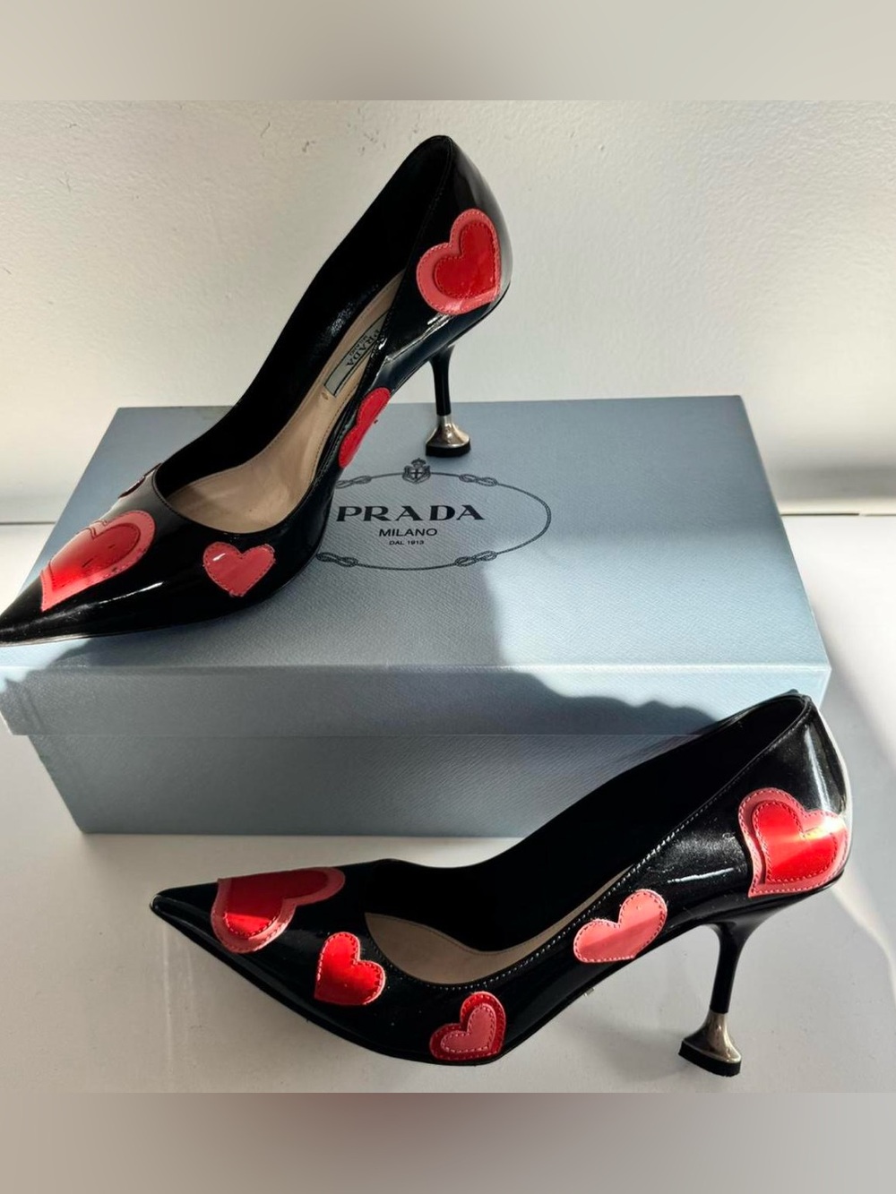 Prada Black Patent Leather Pumps with Red Heart Appliqués